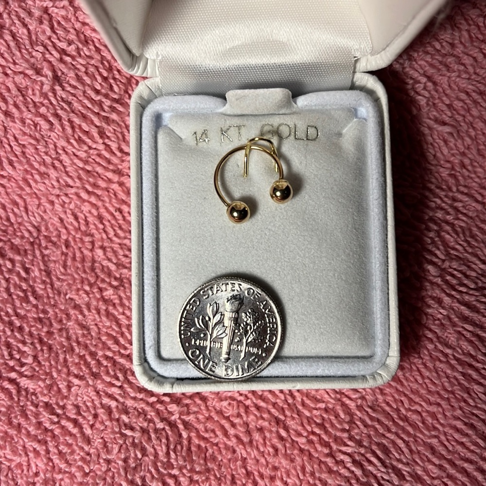 Gold piercing in box never worn.